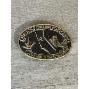 WE03104 VINTAGE 1988 *WORLD HORSESHOE CHAMPIONSHIP* PLEASANTON BRASS BELT BUCKLE